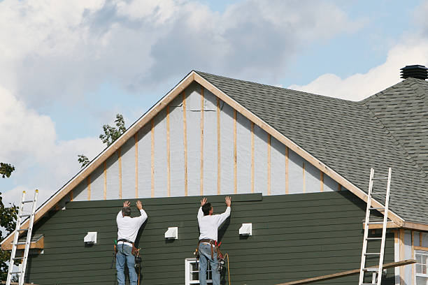 Professional Storm Damage Siding Repair technician working in Salem, MA
